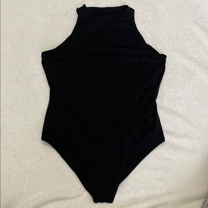 VS Pink XLarge thong body suit in black. High neckline with logo on back. NWOT